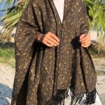 Designer poncho: Elevating Your Wardrobe with Timeless Elegance